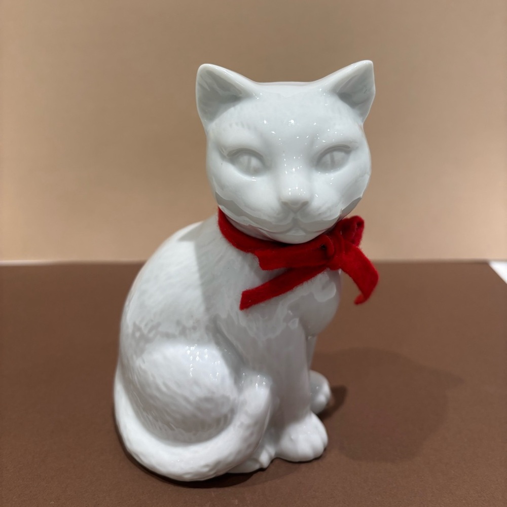 White Ceramic Cat Figurine with Red Bow